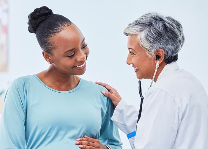 Doctor consulting with patient