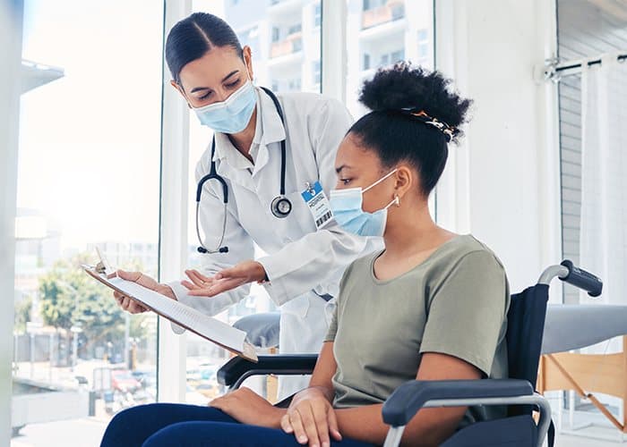 Doctor consulting with patient